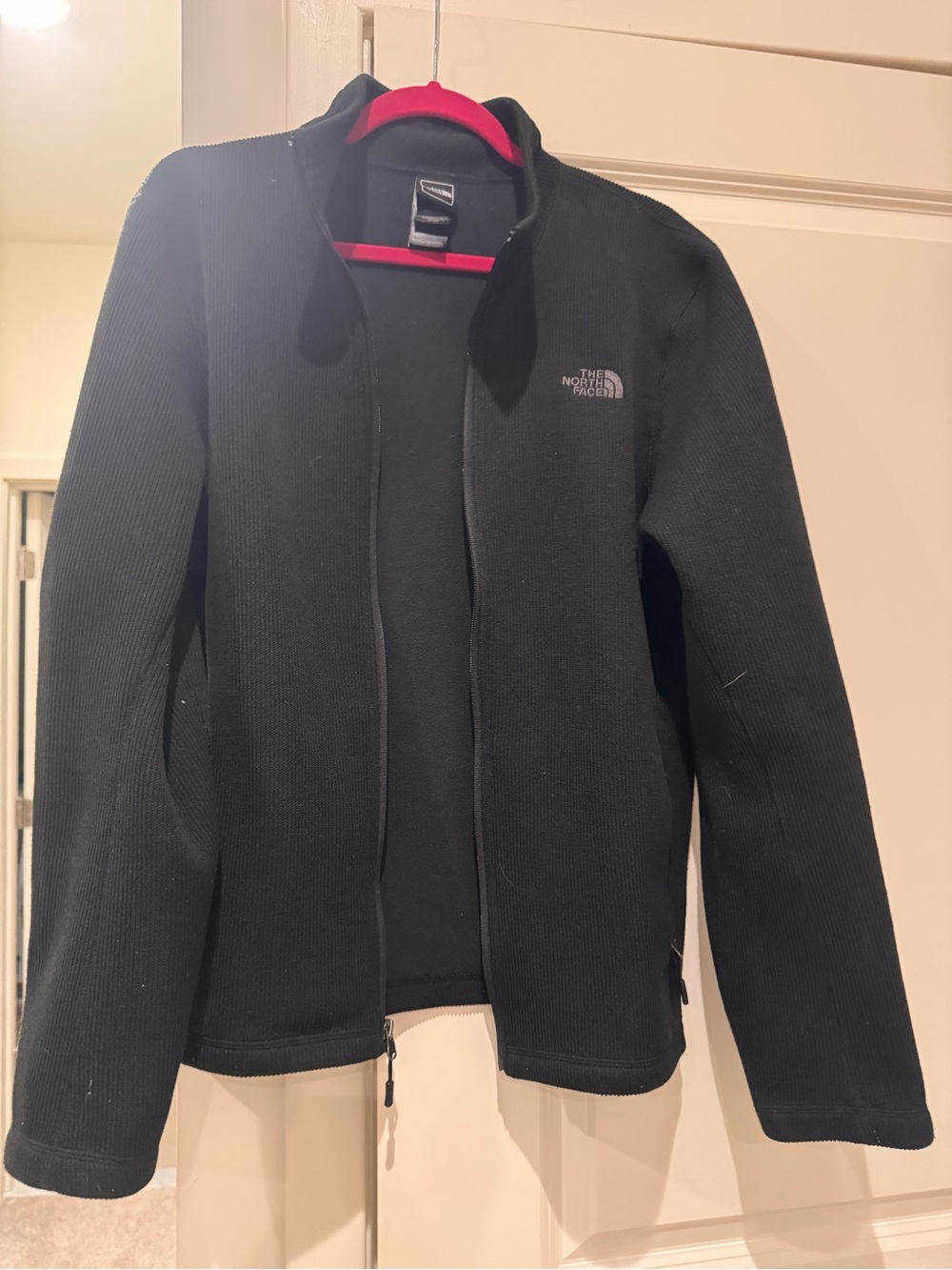 The North Face Black sweater style Jacket